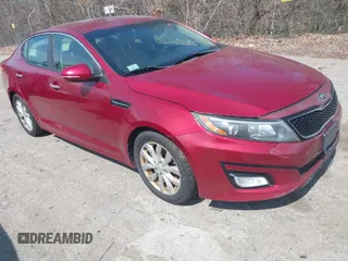 2014 Kia Optima LX with VIN 5XXGM4A77EG326177, listed as a IAAI auction lot 42088542 with 164,237 mi miles. Bid and sale history available at carsss.com. Image 1.