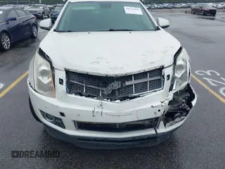 2012 Cadillac SRX Performance Collection with VIN 3GYFNBE38CS547423, listed as a IAAI auction lot 42276365 with 157,786 mi miles and . Bid and sale history available at DreamBid. Image 6.