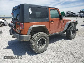 2010 Jeep Wrangler Rubicon with VIN 1J4BA6D12AL186887, listed as a Copart auction lot 57902545 with Not provided miles and Salvage title. Bid and sale history available at DreamBid. Image 3.