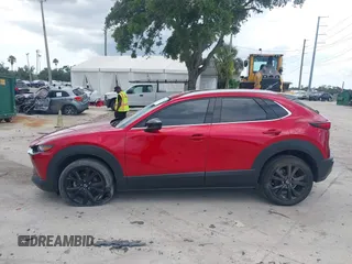 2023 Mazda CX-30 Premium с VIN 3MVDMBDY3PM507398, выставлен на аукционе IAAI как лот 42533176 с пробегом 15 788 миль миль и . История ставок и продаж доступна на DreamBid. Изображение 14.