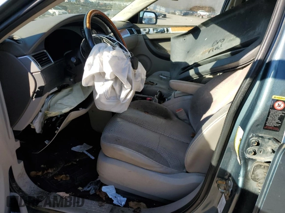 2005 Chrysler Pacifica z VIN 2C8GF78405R471204, wystawiony jako Copart lot #79471964 z przebiegiem Nie podano mil oraz Szkoda całkowita • Salvage title. Historia ofert i sprzedaży dostępna na DreamBid. Obrazek 7.