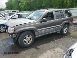 2000 Jeep Grand Cherokee Laredo z VIN 1J4G248S4YC299003, wystawiony jako Copart lot #55937685 z przebiegiem Nie podano mil oraz Szkoda całkowita • Salvage title. Historia ofert i sprzedaży dostępna na DreamBid. Obrazek 1.
