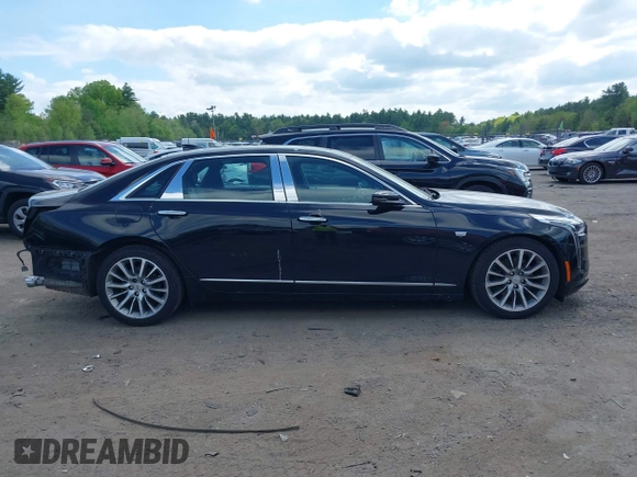 2019 Cadillac CT6 Premium Luxury AWD with VIN 1G6KD5RS3KU123885, listed as a IAAI auction lot 42200429 with 66,611 mi miles and . Bid and sale history available at DreamBid. Image 13.