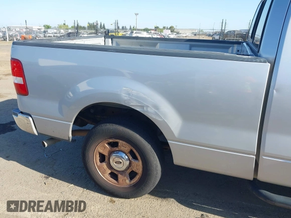 2004 Ford F-150 XL with VIN 1FTPX12594NA32477, listed as a IAAI auction lot 42088113 with 266,389 mi miles. Bid and sale history available at carsss.com. Image 6.