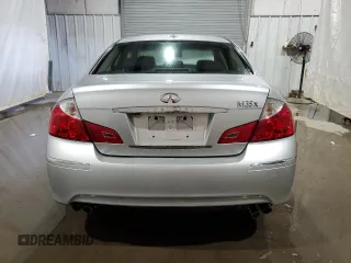 2009 Infiniti M with VIN JNKCY01F39M851190, listed as a Copart auction lot 64297164 with 221,933 mi miles and Salvage Title. Bid and sale history available at DreamBid. Image 6.