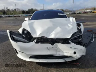 2024 Tesla Model S с VIN 5YJSA1E59RF541014, выставлен на аукционе Copart как лот 86646114 с пробегом 7 404 миль миль и Списание • Salvage title. История ставок и продаж доступна на DreamBid. Изображение 5.