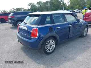 2015 MINI Hardtop 4 Door with VIN WMWXS5C51FT827510, listed as a IAAI auction lot 42365599 with 53,667 mi miles and . Bid and sale history available at DreamBid. Image 4.
