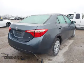 2018 Toyota Corolla L z VIN 5YFBURHE7JP831763, wystawiony jako IAAI lot #41539485 z przebiegiem 95 495 mil mil oraz . Historia ofert i sprzedaży dostępna na DreamBid. Obrazek 4.