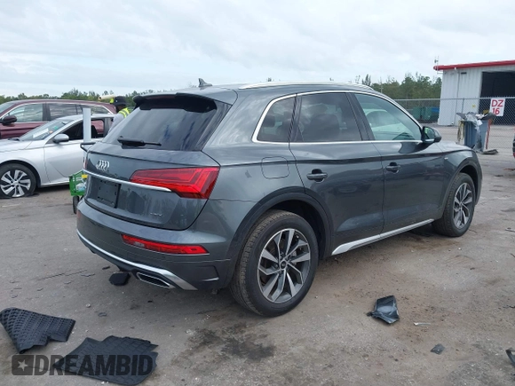 2023 Audi Q5 S line Premium Plus z VIN WA1EAAFY6P2161080, wystawiony jako IAAI lot #41282613 z przebiegiem 20 268 mil mil oraz . Historia ofert i sprzedaży dostępna na DreamBid. Obrazek 4.
