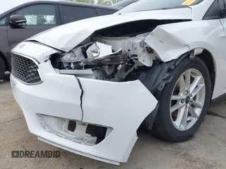 2016 Ford Focus SE with VIN 1FADP3F2XGL324613, listed as a IAAI auction lot 41971597 with 126,738 mi miles. Bid and sale history available at carsss.com. Image 6.