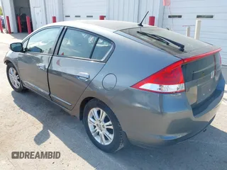 2011 Honda Insight EX z VIN JHMZE2H7XBS006254, wystawiony jako IAAI lot #42222213 z przebiegiem 244 078 mil mil oraz . Historia ofert i sprzedaży dostępna na DreamBid. Obrazek 3.