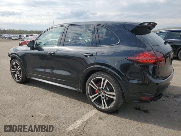 2013 Porsche Cayenne GTS с VIN WP1AD2A29DLA72323, выставлен на аукционе Copart как лот 52990885 с пробегом 100 812 миль миль и Списание • Salvage title. История ставок и продаж доступна на DreamBid. Изображение 2.