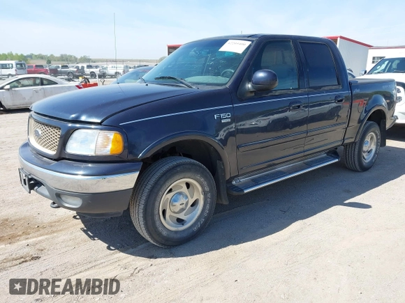 2001 Ford F-150 XLT with VIN 1FTRW08L71KA41543, listed as a IAAI auction lot 42205400 with 69,454 mi miles and . Bid and sale history available at DreamBid. Image 2.