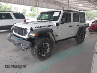 2024 Jeep Wrangler Rubicon X с VIN 1C4RJXR65RW211676, выставлен на аукционе IAAI как лот 42359215 с пробегом 3 143 миль миль и . История ставок и продаж доступна на DreamBid. Изображение 2.