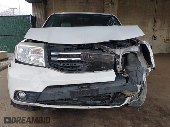 2014 Honda Pilot EX-L with VIN 5FNYF4H59EB047609, listed as a IAAI auction lot 42071353 with 148,661 mi miles and . Bid and sale history available at carsss.com. Image 6.