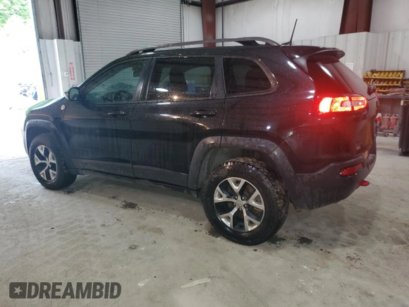 2016 Jeep Cherokee Trailhawk with VIN 1C4PJMBS7GW337774, listed as a Copart auction lot 55184885 with 161,567 mi miles and Salvage title. Bid and sale history available at DreamBid. Image 2.