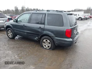 2003 Honda Pilot EX with VIN 2HKYF184X3H561179, listed as a IAAI auction lot 41709312 with 302,368 mi miles. Bid and sale history available at carsss.com. Image 3.