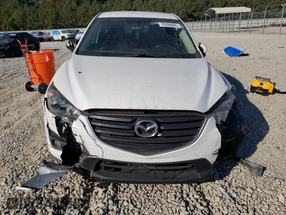 2016 Mazda CX-5 Touring with VIN JM3KE2CY6G0896040, listed as a Copart auction lot 78399684 with 98,639 mi miles and Salvage Title. Bid and sale history available at DreamBid. Image 5.