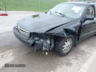 1999 Chevrolet Malibu LS with VIN 1G1NE52M1X6202060, listed as a IAAI auction lot 42011861 with 203,273 mi miles and . Bid and sale history available at DreamBid. Image 6.