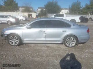2016 Volkswagen Passat 1.8T SEL with VIN 1VWCT7A35GC011006, listed as a IAAI auction lot 41039744 with 123,422 mi miles. Bid and sale history available at carsss.com. Image 14.