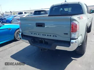 2023 Toyota Tacoma SR with VIN 3TMCZ5AN3PM590101, listed as a IAAI auction lot 42338670 with 12,970 mi miles and . Bid and sale history available at DreamBid. Image 16.