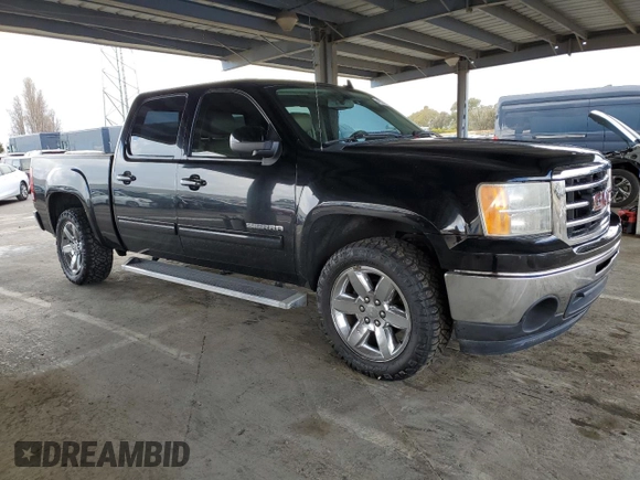 2012 GMC Sierra 1500 with VIN 3GTP1WE22CG290959, listed as a Copart auction lot 49271025 with 153,733 mi miles and Salvage Title. Bid and sale history available at DreamBid. Image 4.