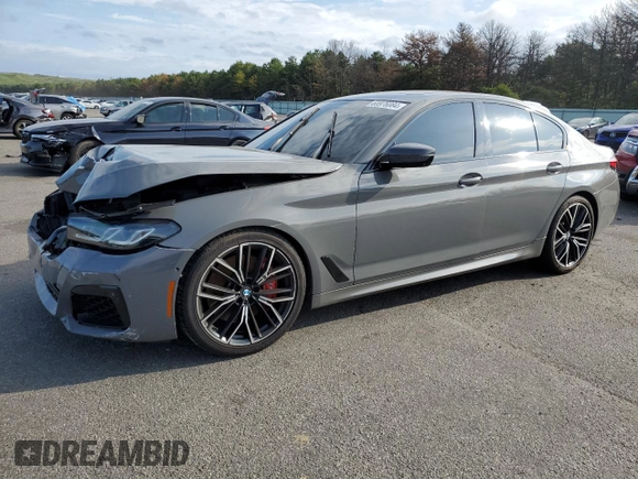2022 BMW 5 Series M550i xDrive z VIN WBA13BK00NCJ03264, wystawiony jako Copart lot #68976084 z przebiegiem 39 515 mil mil oraz Szkoda całkowita • Salvage title. Historia ofert i sprzedaży dostępna na DreamBid. Obrazek 1.