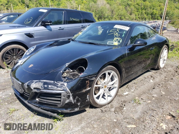 2018 Porsche 911 Carrera z VIN WP0AA2A93JS106166, wystawiony jako Copart lot #51105893 z przebiegiem 11 476 mil mil oraz . Historia ofert i sprzedaży dostępna na DreamBid. Obrazek 1.