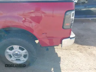 2005 Ford F-150 XLT with VIN 1FTPW12555KD00513, listed as a IAAI auction lot 41885017 with 217,032 mi miles. Bid and sale history available at carsss.com. Image 12.