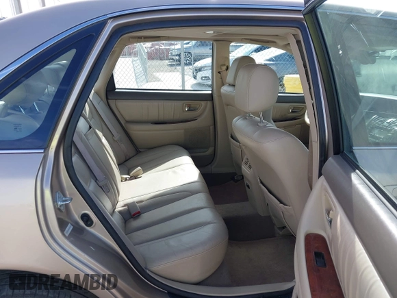 2002 Toyota Avalon XL with VIN 4T1BF28B42U264581, listed as a IAAI auction lot 42034260 with 155,296 mi miles and . Bid and sale history available at DreamBid. Image 8.