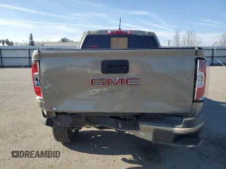 2022 GMC Canyon 4WD Elevation z VIN 1GTG6CEN5N1298548, wystawiony jako Copart lot #41426075 z przebiegiem 15 947 mil mil oraz Szkoda całkowita • Salvage title. Historia ofert i sprzedaży dostępna na DreamBid. Obrazek 6.