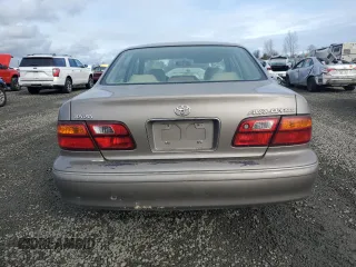 1998 Toyota Avalon XL with VIN 4T1BF18B0WU284522, listed as a Copart auction lot 45590925 with 278,690 mi miles and Salvage Title. Bid and sale history available at DreamBid. Image 6.