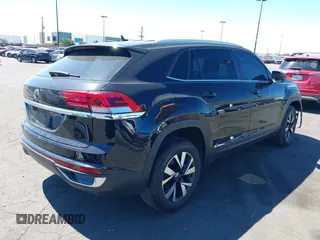 2023 Volkswagen Atlas SE z VIN 1V2DC2CA0PC206192, wystawiony jako IAAI lot #41856061 z przebiegiem 23 572 mil mil oraz . Historia ofert i sprzedaży dostępna na DreamBid. Obrazek 4.