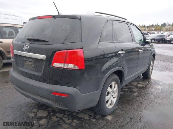 2012 Kia Sorento LX with VIN 5XYKTDA64CG309107, listed as a IAAI auction lot 41977359 with 213,006 mi miles. Bid and sale history available at carsss.com. Image 4.