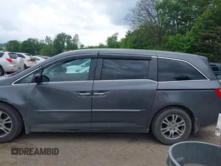 2012 Honda Odyssey EX z VIN 5FNRL5H45CB084342, wystawiony jako IAAI lot #42329303 z przebiegiem 173 711 mil mil oraz . Historia ofert i sprzedaży dostępna na DreamBid. Obrazek 14.