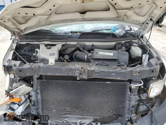2008 Chevrolet Express Cargo z VIN 1GCFG15X581215851, wystawiony jako Copart lot #55747555 z przebiegiem Nie podano mil oraz Szkoda całkowita • Salvage title. Historia ofert i sprzedaży dostępna na DreamBid. Obrazek 12.