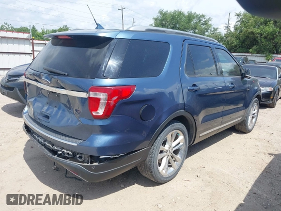 2018 Ford Explorer XLT z VIN 1FM5K7D89JGA54555, wystawiony jako IAAI lot #42375872 z przebiegiem 89 115 mil mil oraz . Historia ofert i sprzedaży dostępna na DreamBid. Obrazek 4.