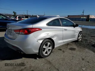 2013 Hyundai Elantra Coupe GS PZEV with VIN KMHDH6AE0DU002493, listed as a Copart auction lot 64396334 with 122,816 mi miles and Salvage Title. Bid and sale history available at carsss.com. Image 3.