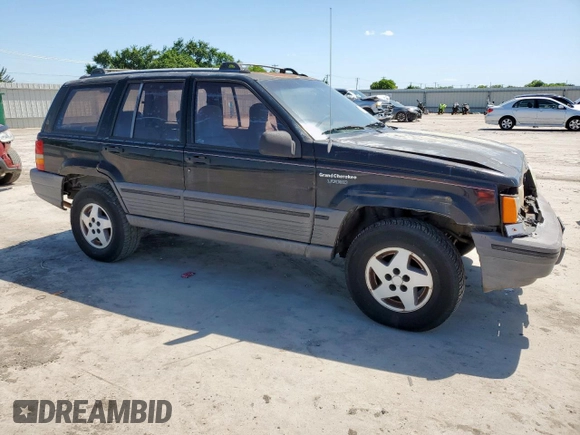 1995 Jeep Grand Cherokee Laredo z VIN 1J4FX58S9SC534442, wystawiony jako Copart lot #61233725 z przebiegiem 363 688 mil mil oraz Szkoda całkowita • Salvage title. Historia ofert i sprzedaży dostępna na DreamBid. Obrazek 4.