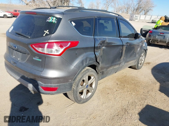2014 Ford Escape SE with VIN 1FMCU0GX6EUA77052, listed as a IAAI auction lot 41344294 with 223,184 mi miles. Bid and sale history available at carsss.com. Image 4.