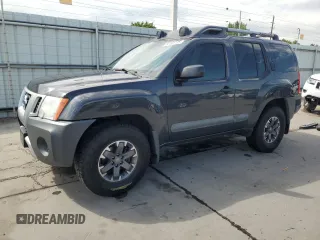 2015 Nissan Xterra S with VIN 5N1AN0NW9FN655140, listed as a Copart auction lot 60101175 with 131,280 mi miles and Salvage title. Bid and sale history available at DreamBid. Image 1.