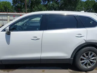2019 Mazda CX-9 Touring z VIN JM3TCBCY2K0300702, wystawiony jako IAAI lot #42194050 z przebiegiem 98 247 mil mil oraz . Historia ofert i sprzedaży dostępna na DreamBid. Obrazek 14.