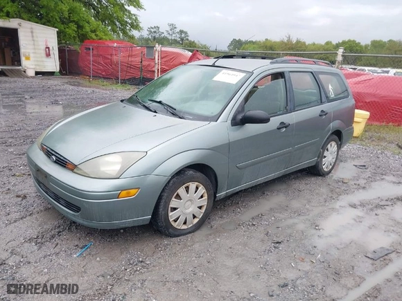 2004 Ford Focus SE with VIN 1FAFP36Z34W152554, listed as a IAAI auction lot 41964947 with 214,886 mi miles. Bid and sale history available at carsss.com. Image 2.