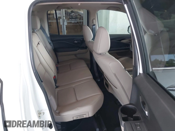 2020 Honda Ridgeline RTL-E with VIN 5FPYK3F71LB005028, listed as a IAAI auction lot 42167883 with 81,882 mi miles and . Bid and sale history available at DreamBid. Image 8.