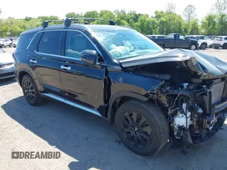 2023 Hyundai Palisade SEL with VIN KM8R2DGE1PU595532, listed as a IAAI auction lot 42219979 with 41,410 mi miles and . Bid and sale history available at DreamBid. Image 1.