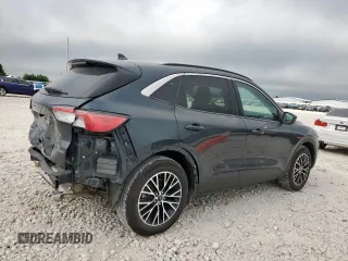 2022 Ford Escape SEL Plug-In Hybrid z VIN 1FMCU0KZ9NUB95198, wystawiony jako Copart lot #61973725 z przebiegiem 15 502 mil mil oraz Szkoda całkowita • Salvage title. Historia ofert i sprzedaży dostępna na DreamBid. Obrazek 3.