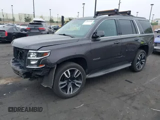2015 Chevrolet Tahoe LT with VIN 1GNSCBKC1FR233898, listed as a IAAI auction lot 42004048 with 115,779 mi miles and . Bid and sale history available at DreamBid. Image 20.