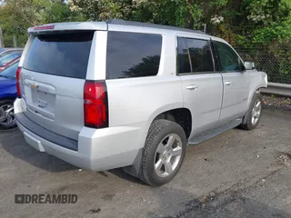 2019 Chevrolet Tahoe LT with VIN 1GNSCBKCXKR219413, listed as a IAAI auction lot 42013260 with 92,886 mi miles and . Bid and sale history available at DreamBid. Image 4.