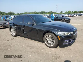 2018 BMW 3 Series 330i xDrive with VIN WBA8D9G56JNU69320, listed as a Copart auction lot 60794345 with 104,036 mi miles and Salvage title. Bid and sale history available at DreamBid. Image 4.