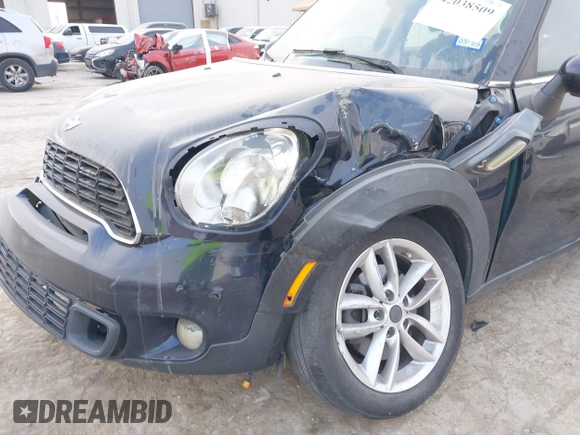 2013 MINI Countryman S with VIN WMWZC3C59DWP24390, listed as a IAAI auction lot 42038509 with 134,903 mi miles and . Bid and sale history available at DreamBid. Image 6.